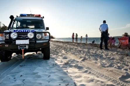 police vehicle on a beach