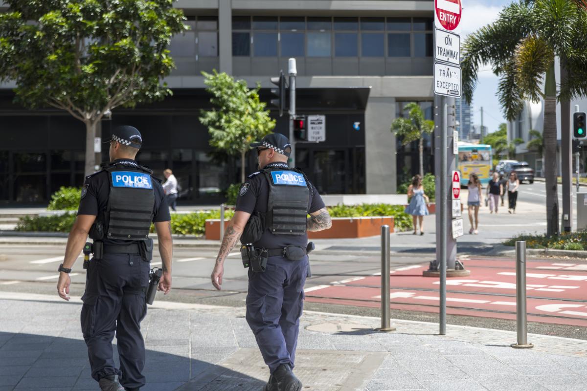 2 police officers on patrol in city precinct